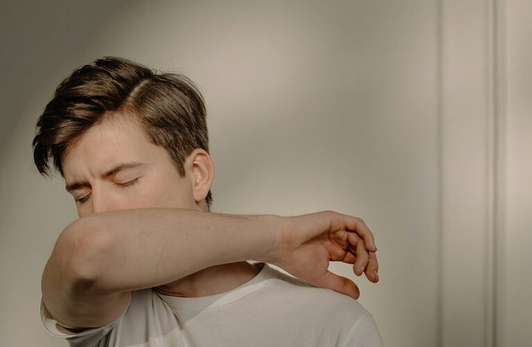 cover mouth and nose