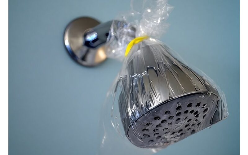 Nuvalykite dušo galvutę actu